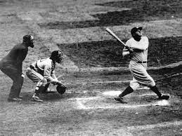 photo of babe ruth hitting a baseball