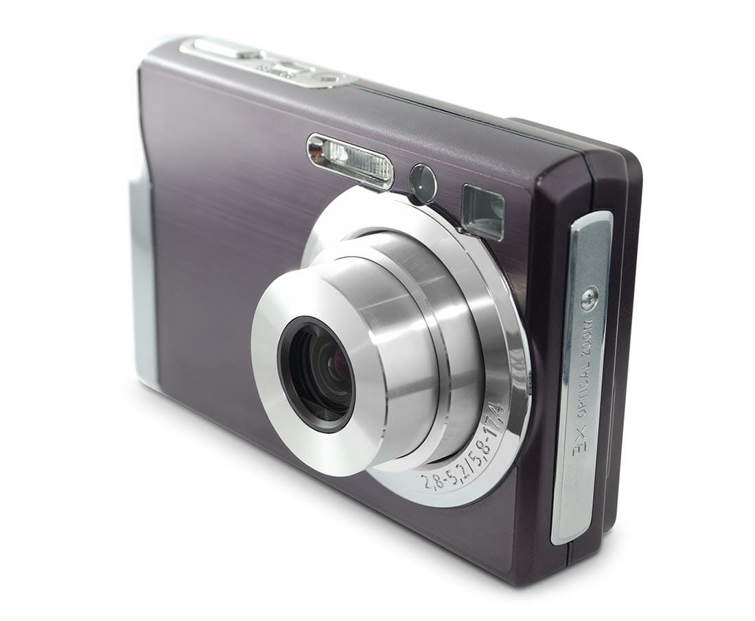 Digital compact photo camera isolated on white background