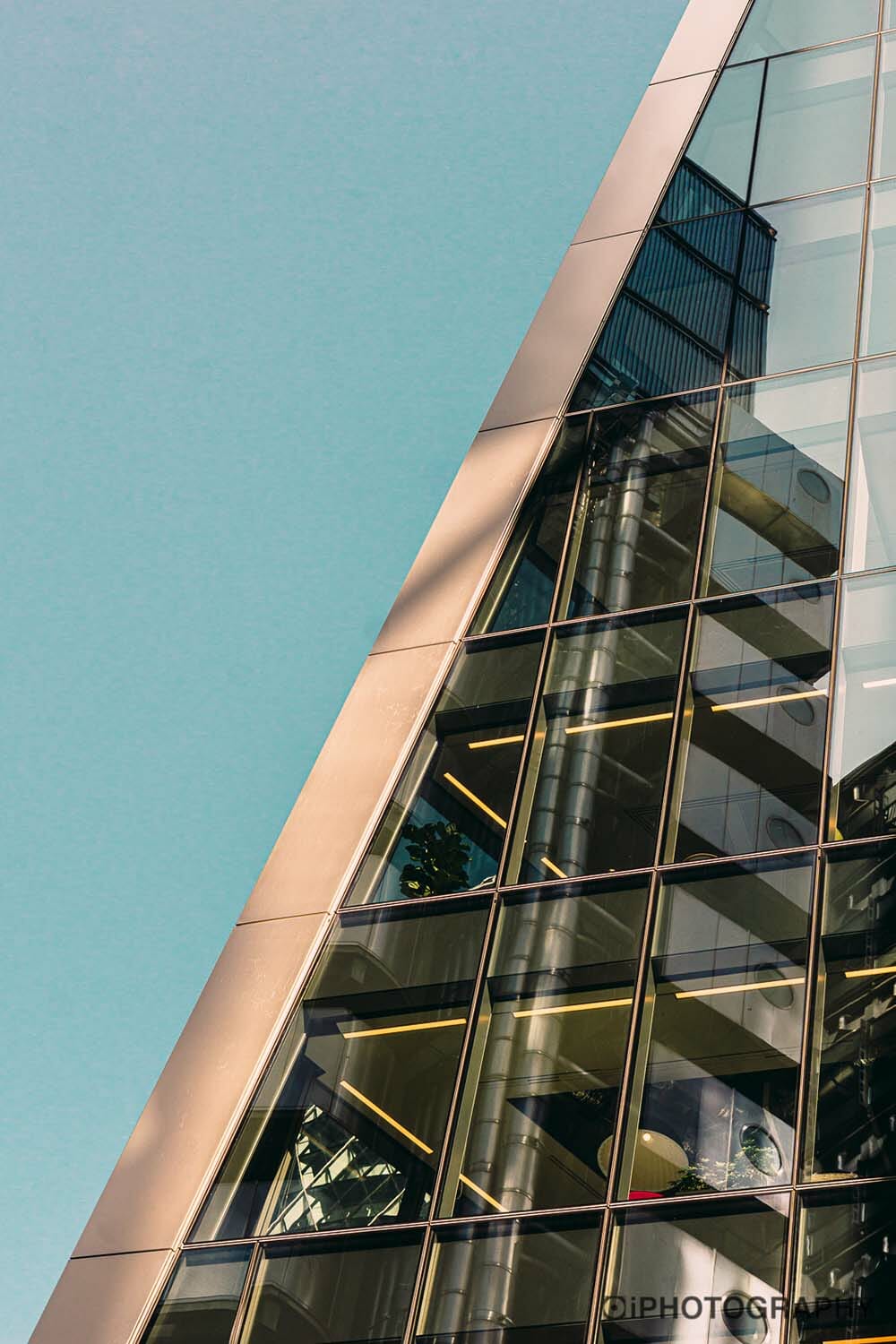 reflections on the windows of a building in London