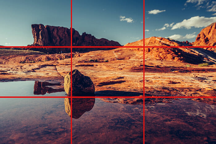 Landscape at sunset with a rule of thirds photography grid over the top