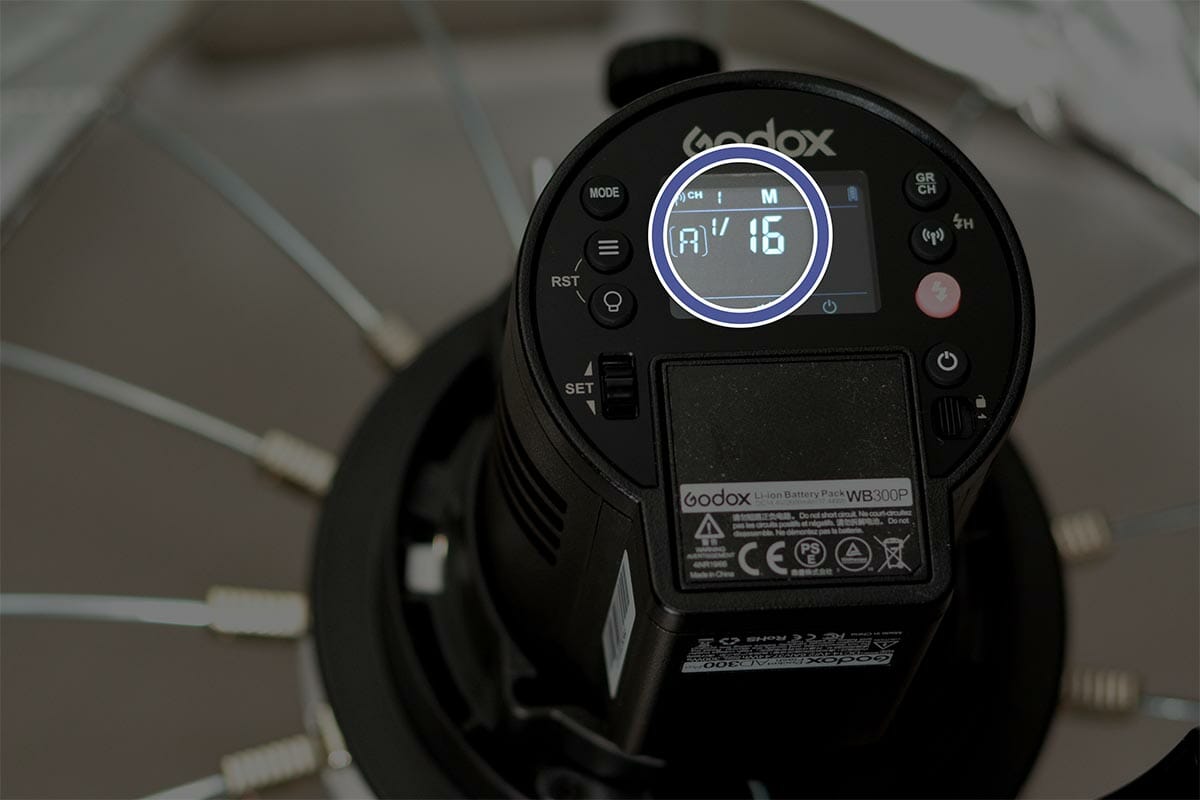Cairo, Egypt, June 9 2022: A portable Godox AD300 Pro outdoor flash head, a great asset on location or in the studio with a lithium-ion battery installed on a Godox S2 speedlite bracket for Bowens