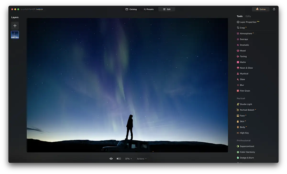 Screenshot of Luminar Neo Neon Glow Effect a person stood on a car roof at night time. Stars are in the sky.