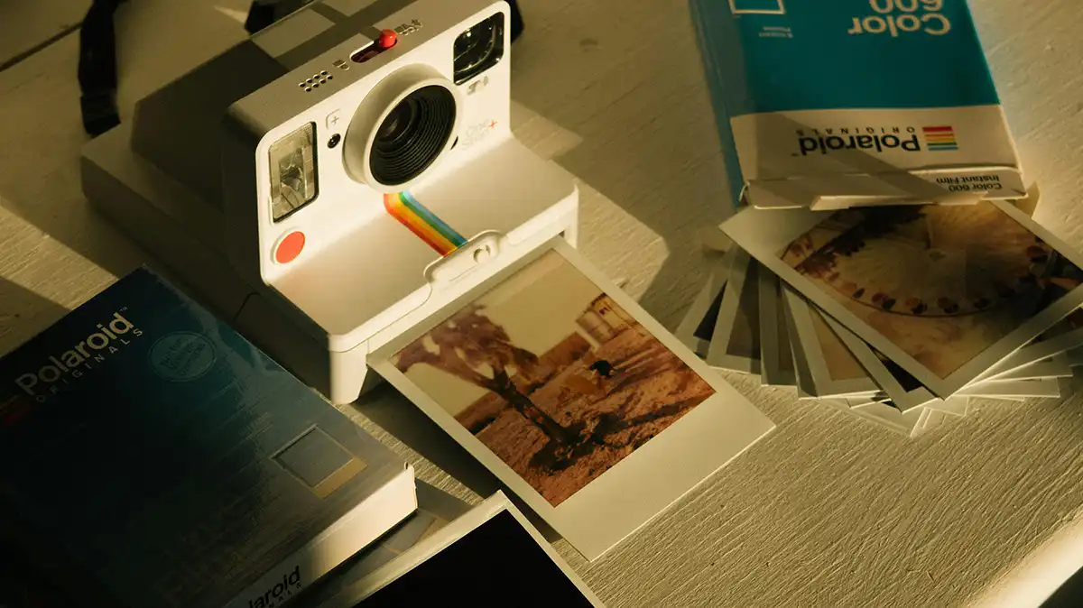 Retro Polaroid camera with a print developed