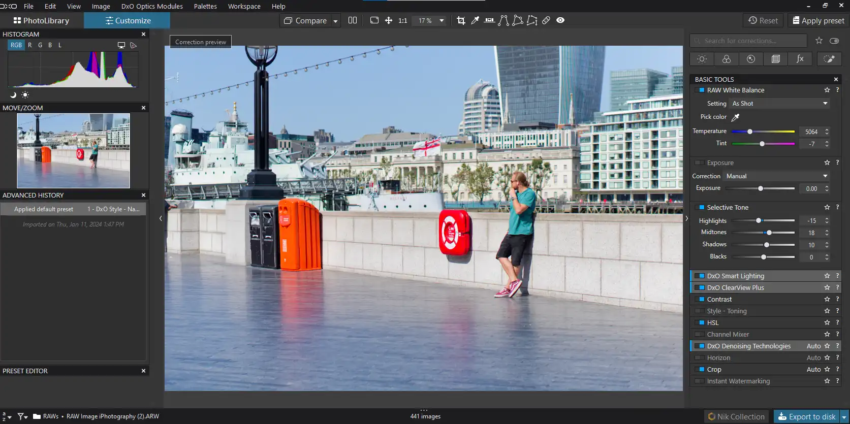 DxO PhotoLab7 interface with a photo of a man leading against a wall in London