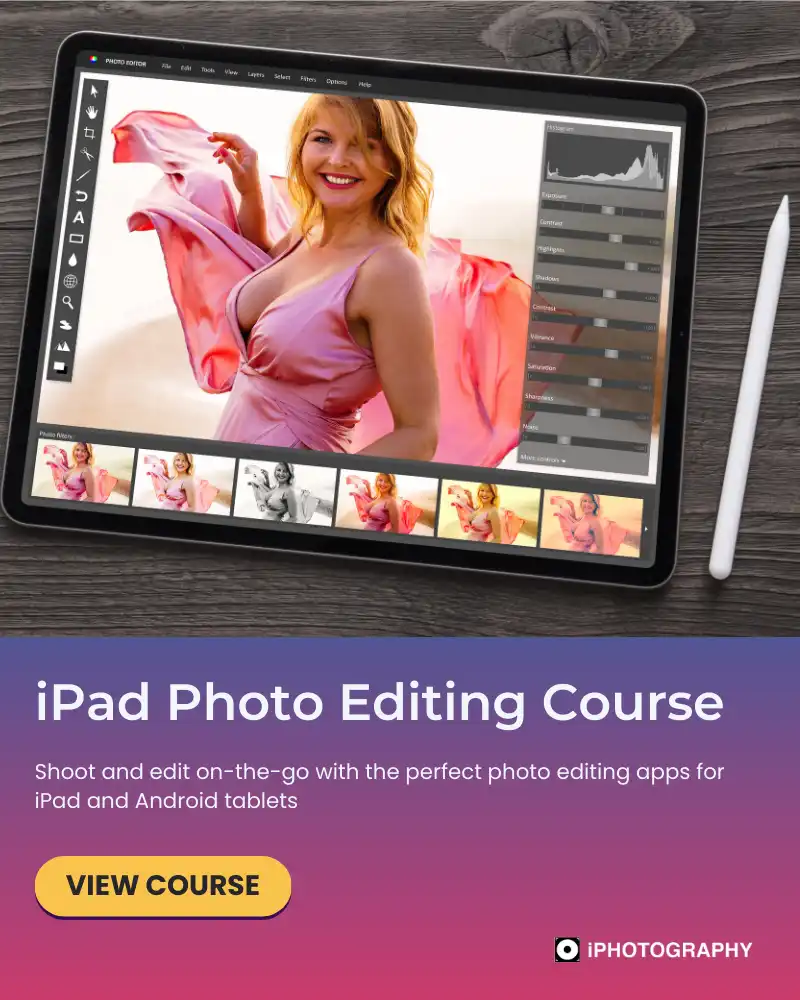 an ipad with photo editing software on screen next to a digital stylus pencil