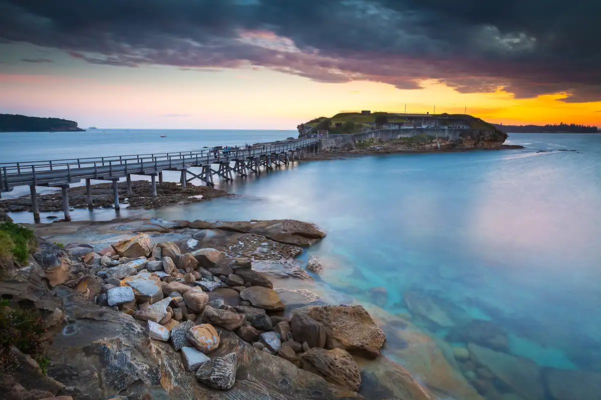 Seascape with a moody sky at sunset
