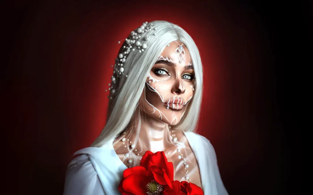 a woman dressed up as a skull creative makeup with red background