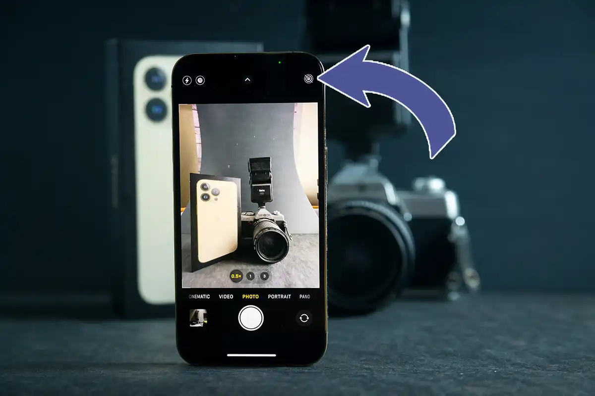 iPhone taking photo of an old film camera