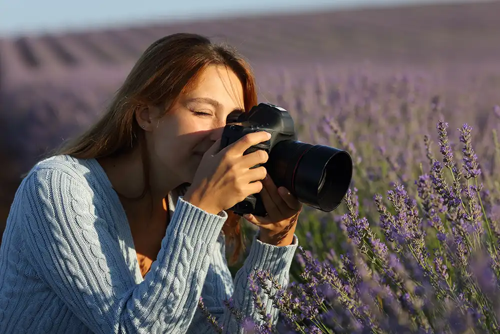 lady taking photo of lavender