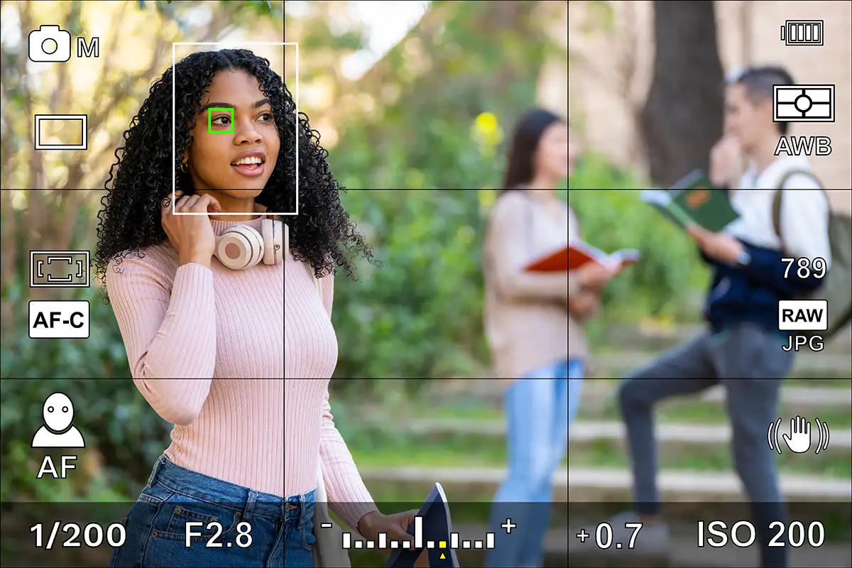 lady talking on the phone through a camera screen