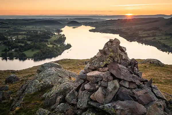 the view from the cairn at the top of Hallin Fell in the Lake District UK