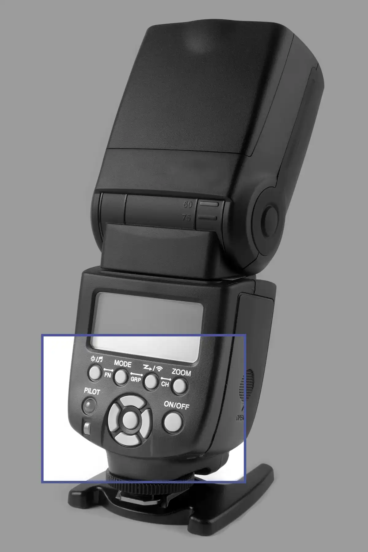 Close up of buttons on the back of a camera flash