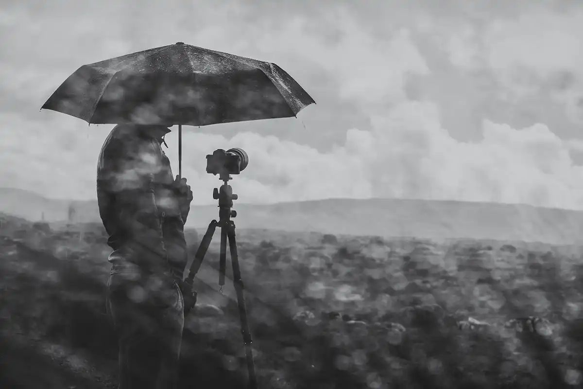 photographer in the rain
