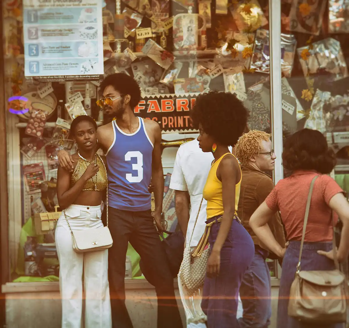 Retro photo of people standing on a street in the 70's
