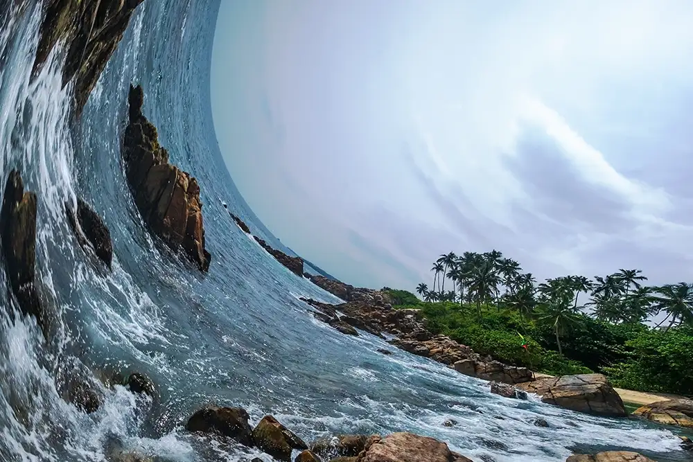 A warped landscape of a rocky beach